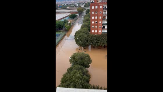 Besòs River flooding engulfs parks and streets in Sant Adrià de Besòs, Spain