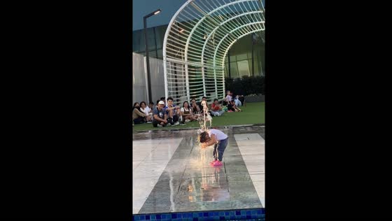Child enjoys fountain play at SM Mall of Asia, Philippines