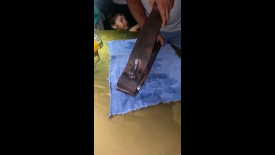 Man showcases oversized nail clipper in Maracaibo, Venezuela
