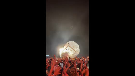 Katy Perry crowd-surfs in giant inflatable bottle during concert in Arras, France