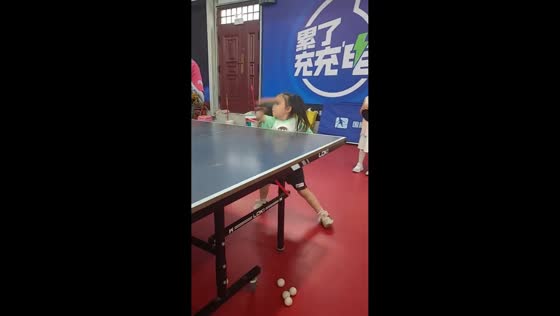 Young girl demonstrates table tennis skills in Henan, China