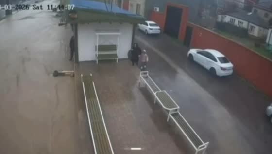 Man rescues child swept by rainwater in Makhachkala, Dagestan, Russia