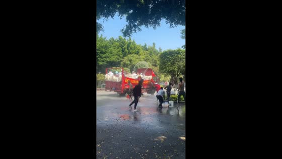 Water Splashing Festival celebration with street dancing in Yunnan, China