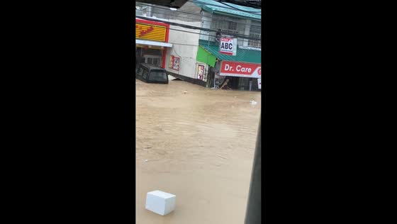 Floodwaters rise rapidly during Typhoon Basyang in Iligan, Philippines