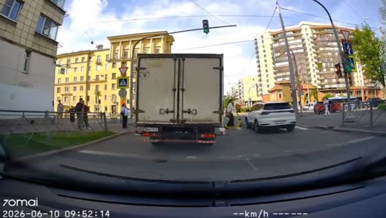 Scooter rider runs red light and collides with car at crossing in St. Petersburg, Russia