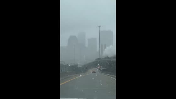 Snowfall reduces visibility along I-93 near downtown Boston, Massachusetts, USA