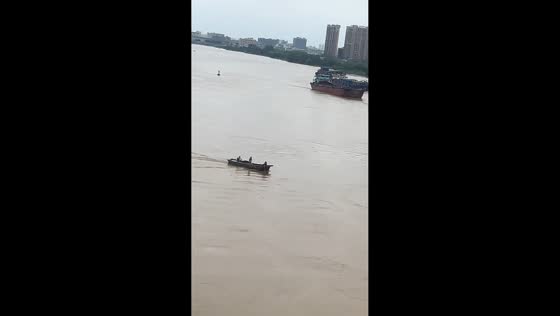 Boat rescues child from fast-flowing river beneath Xiqiao Bridge in Guangdong, China