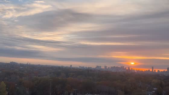 Beautiful sunrise view over lake and cityscape in Cambridge, Massachusetts, USA