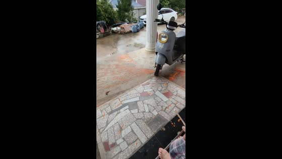 Bloated bottle spills mess on the ground in Anhui, China
