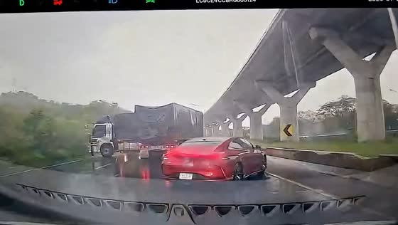 Multiple trucks collide on rain-soaked highway in Sikhiu, Thailand