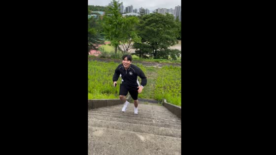 Person runs backwards down University of Suwon stairs