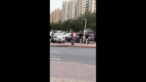 Skateboarder falls after failed ollie on pedestrian lane in Xinjiang, China
