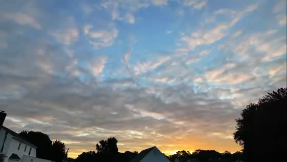 Sunrise breaks through after days of gray skies in Chester, Virginia, USA