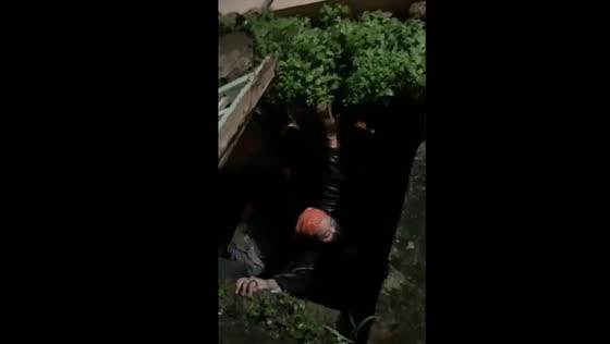 Girl falls into pit in Samarinda, Indonesia