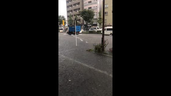 Torrential rain floods streets in Kawasaki, Japan