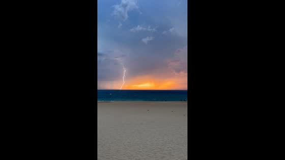 Anvil crawler lightning lights up coastal storm in Hossegor, France