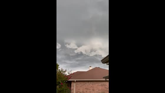 Tornado sirens sound as dark clouds form in Denton, Texas, USA