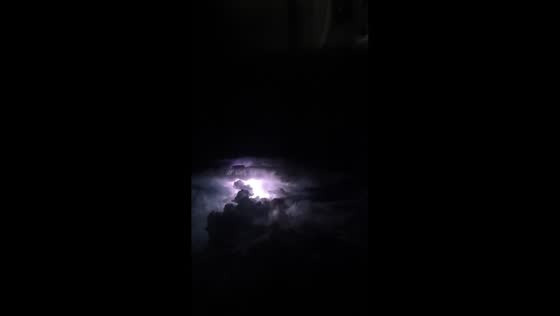 Lightning flashes through massive thunderstorm clouds over Tapachula, Mexico