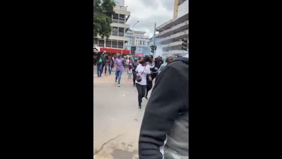 Protesters flee tear gas in Nairobi during demonstrations against Finance Bill 2024