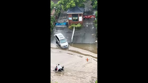 Floodwater covers residential estate entrance in Jiangsu, China