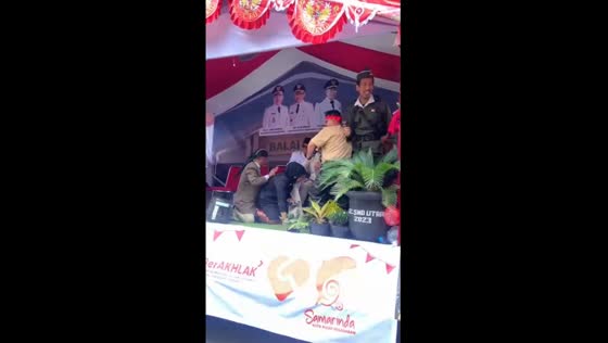 Unexpected halt: parade vehicle sends participants tumbling, laughter ensues