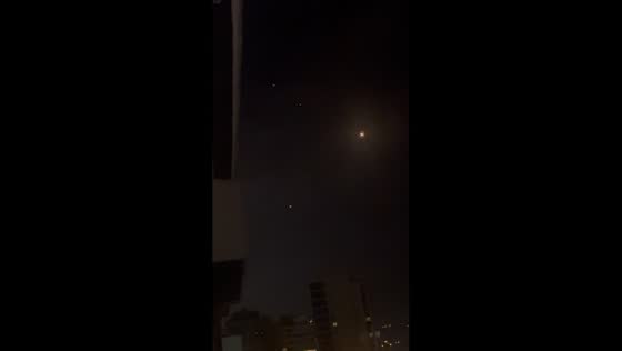 Multiple lights fall from the sky over Beirut, Lebanon