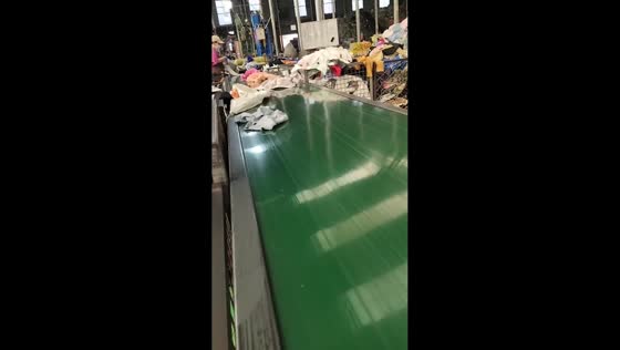 Worker startled by hidden snake toy on conveyor in Guangdong, China