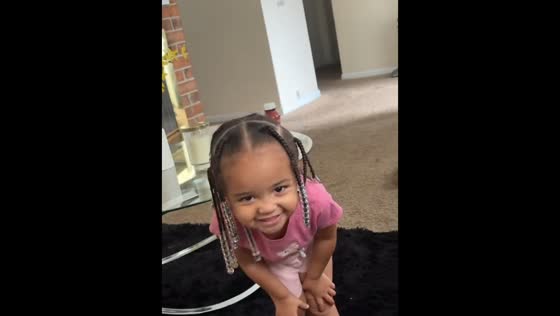 Little girl repeats curse words while laughing in Suffolk, England, UK