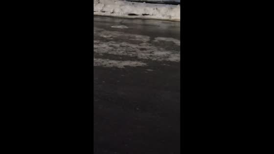 Overnight freezing rain leaves hills and sidewalks icy in Massachusetts, USA