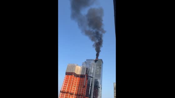 Skyscraper fire and crane collapse: dramatic scene unfolds at 41st and 10th Ave, New York