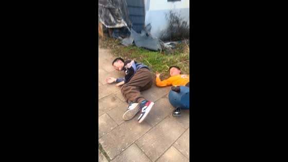 Boys tumble off wiggle cars after veering off hill in Hunan, China