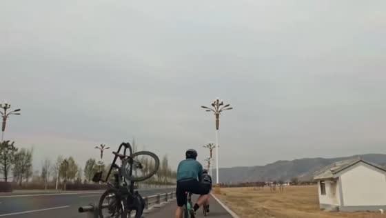 Cycling enthusiast collides with road rail barrier, escapes unharmed