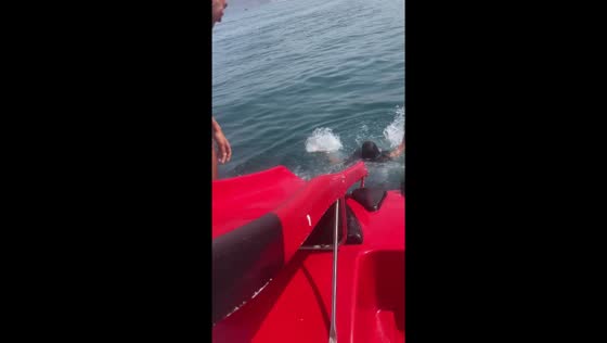 Person slips into water, laughter follows