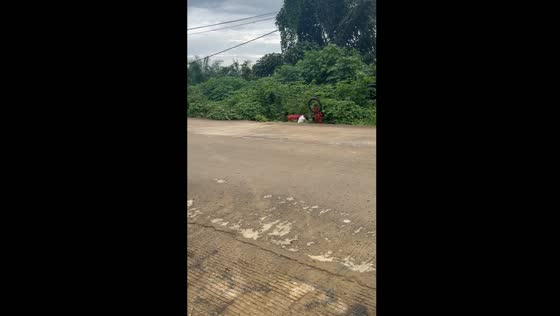 Bike rider falls into ditch in Paser Regency, East Kalimantan, Indonesia