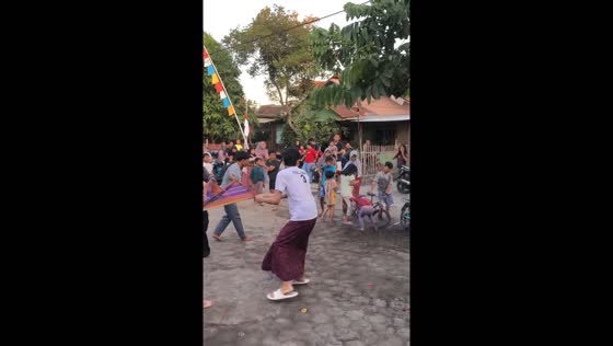 Water balloon hits child during volleyball game in Indonesia