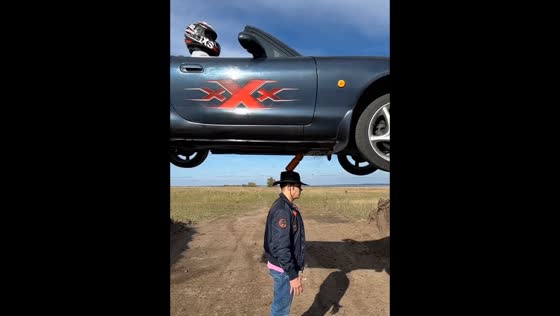 A dangerous stunt involving a bottle on his head being knocked off by a car