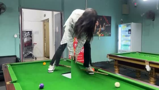 Player's fury: billiards tablecloth ripped in frustration