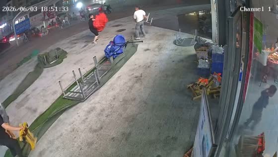 Strong wind lifts tables outside shop in Shandong, China
