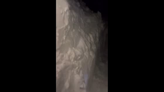 Massive snowdrifts block homes after rare cyclone in Petropavlovsk-Kamchatsky, Russia