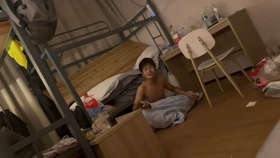 Man hilariously crashes through bunk bed after friend kicks plywood panel in Zhejiang, China