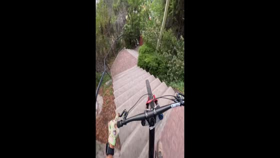 Biking mastery: navigating Santiago's challenging staircase path