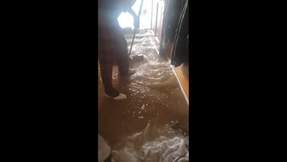 Thunderstorm aftermath floods homes in North Valley, Albuquerque, New Mexico