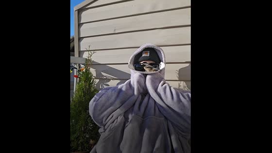 Bird lands on person wearing disguise in Fraser Valley, Canada
