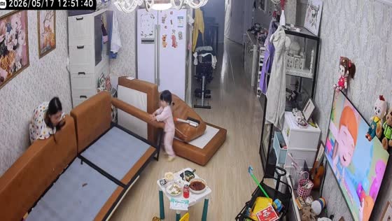 Girl gets startled while mother moves couch in Hebei, China