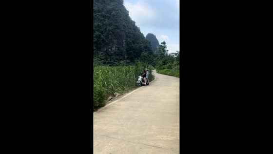Woman loses control causing sidecar motorcycle crash in Guangxi, China
