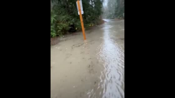Sudden flood overwhelms roads in Fall City, Washington, USA