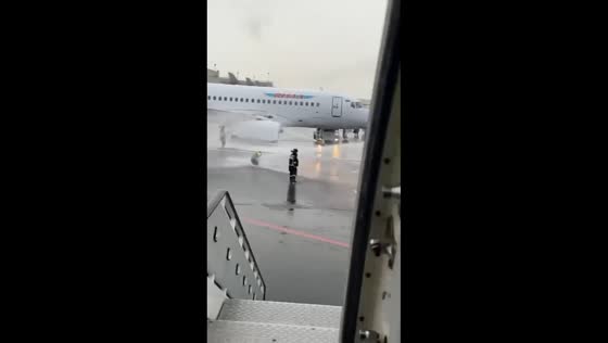 Ground service worker knocked down by fire hose at Pulkovo Airport, Saint Petersburg, Russia