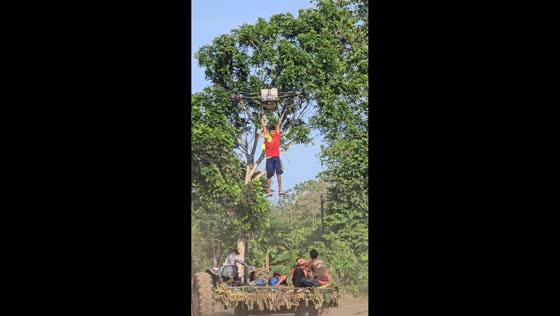 Man rides low-flying drone before smooth descent in San Lorenzo, Guatemala