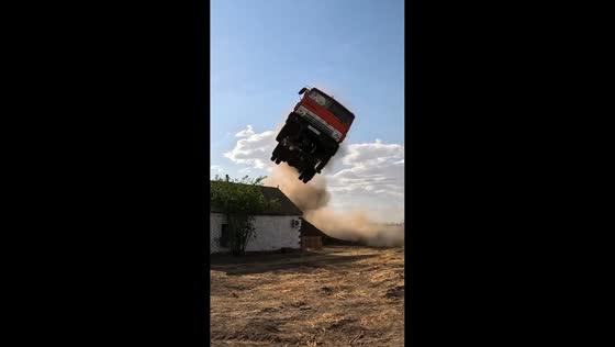 Man jumps between moving trucks before one crashes off ramp in Rostov-on-Don, Russia