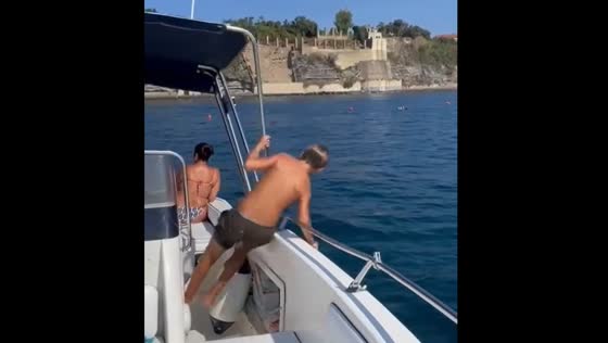 Boy slips and falls inside a boat in Procida, Italy